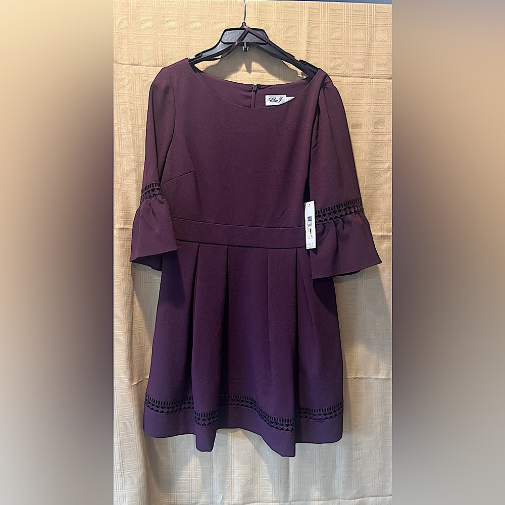 Deep plum dress with cutouts in sleeve and hem by Eliza J.